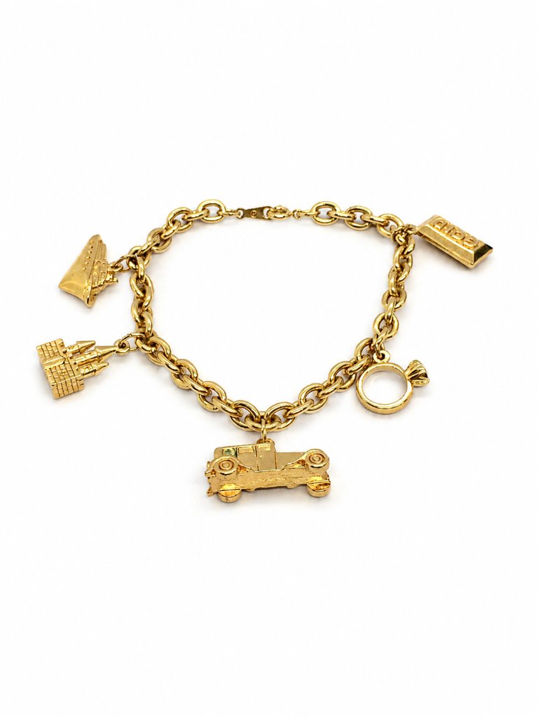 Vintage Avon Bracelet Rich & Famous Gold Tone 5 Charm Travel Theme 1980s
